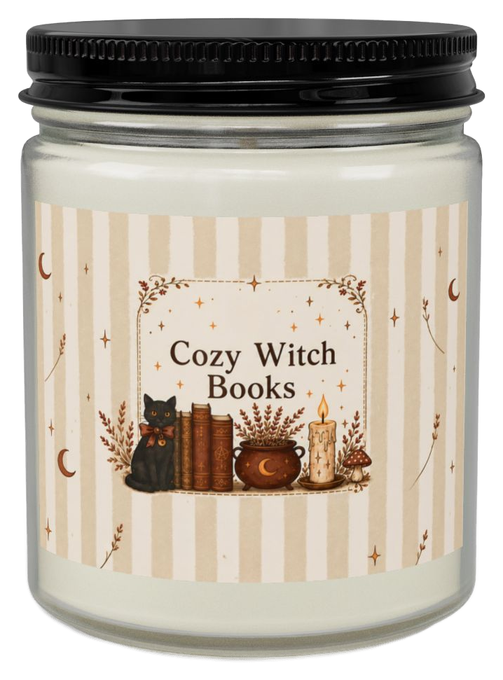 Cozy Witch Books candle in a clear jar on a plain background
