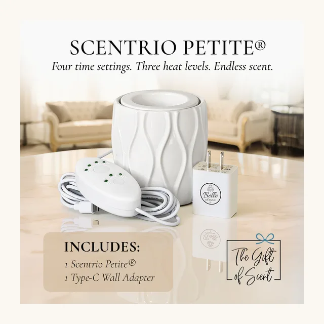 White ceramic petite wax warmer on a cream marble table