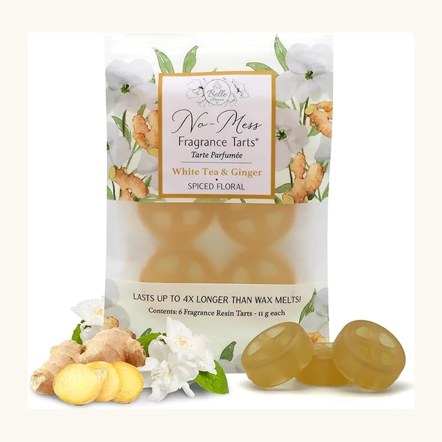White tea and ginger fragrance tarts in a cream floral pouch with white blossoms